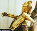 A behind the scenes photo of the See-Threepio puppet from The Empire Strikes Back.