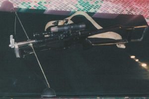 A photo of a bowcaster prop on display at Planet Hollywood.